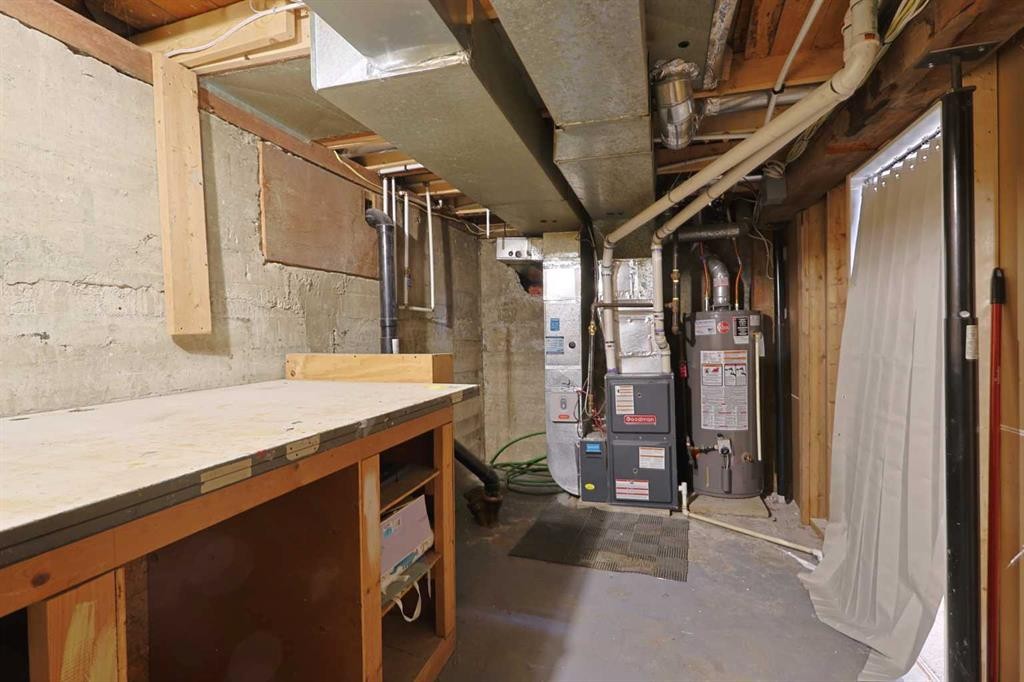 18 Maple Street, Okotoks, AB - Indoor Photo Showing Basement