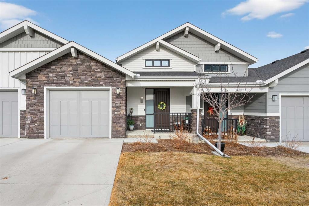 206 Crestridge Common Sw, Calgary, AB - Outdoor With Deck Patio Veranda With Facade