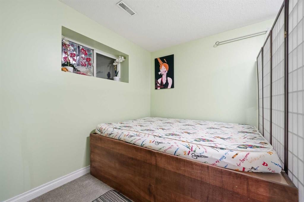 80 Taradale Drive South, Calgary, AB - Indoor Photo Showing Bedroom