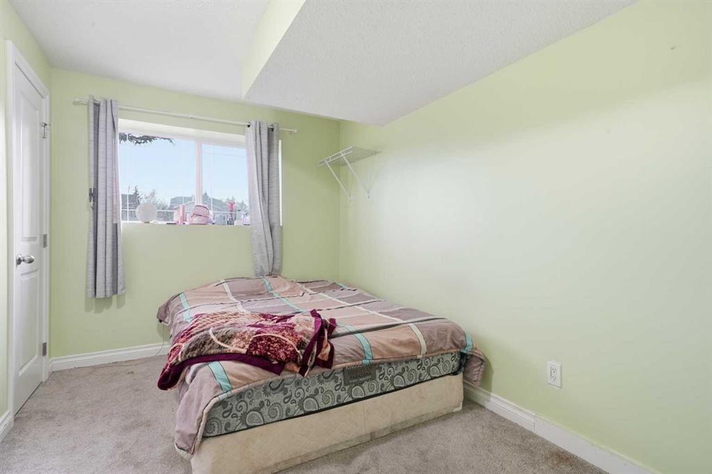 80 Taradale Drive South, Calgary, AB - Indoor Photo Showing Bedroom