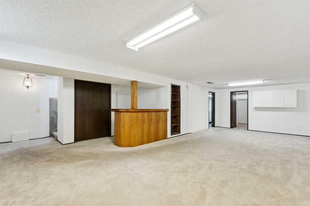 248 Huntcroft Road Ne, Calgary, AB - Indoor Photo Showing Other Room