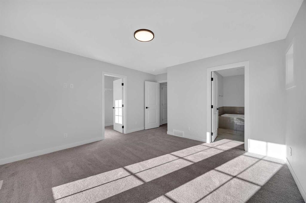 26 Versant Path Sw, Calgary, AB - Indoor Photo Showing Other Room