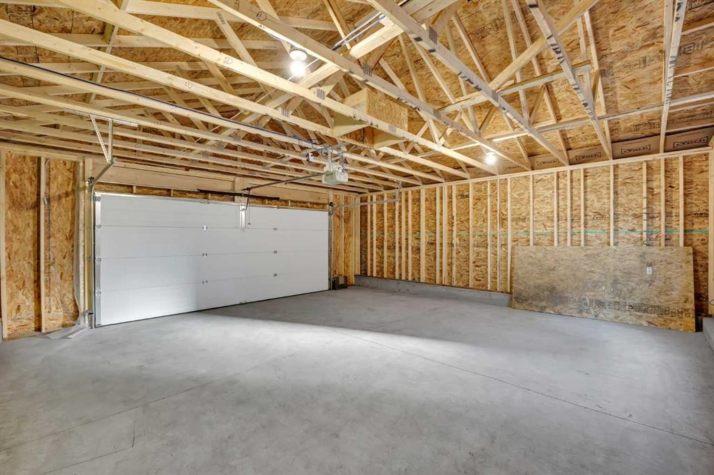 26 Versant Path Sw, Calgary, AB - Indoor Photo Showing Garage