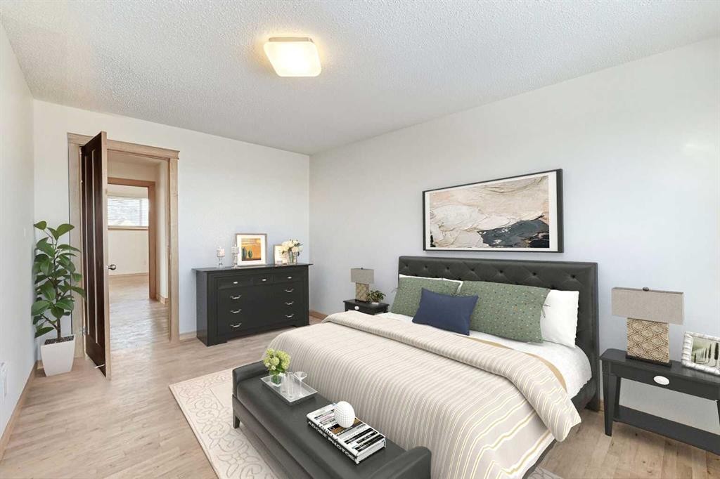 48 Bernard Way Nw, Calgary, AB - Indoor Photo Showing Bedroom