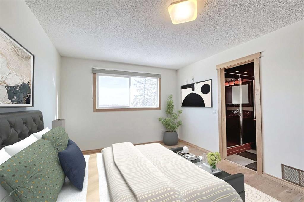 48 Bernard Way Nw, Calgary, AB - Indoor Photo Showing Bedroom