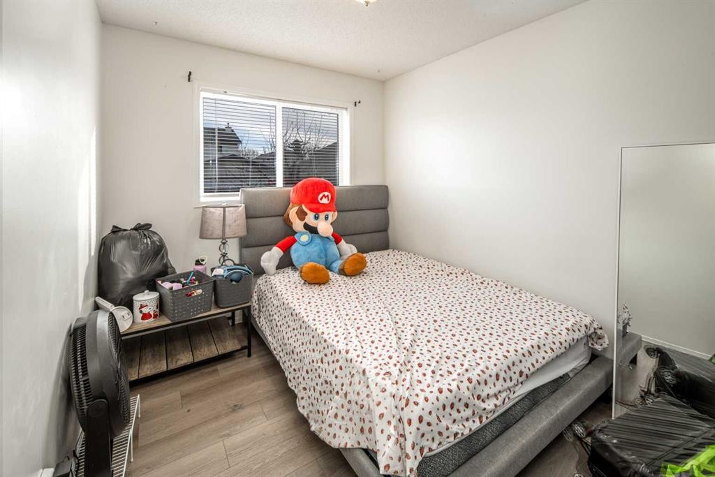 324 Harvest Rose Circle Ne, Calgary, AB - Indoor Photo Showing Bedroom