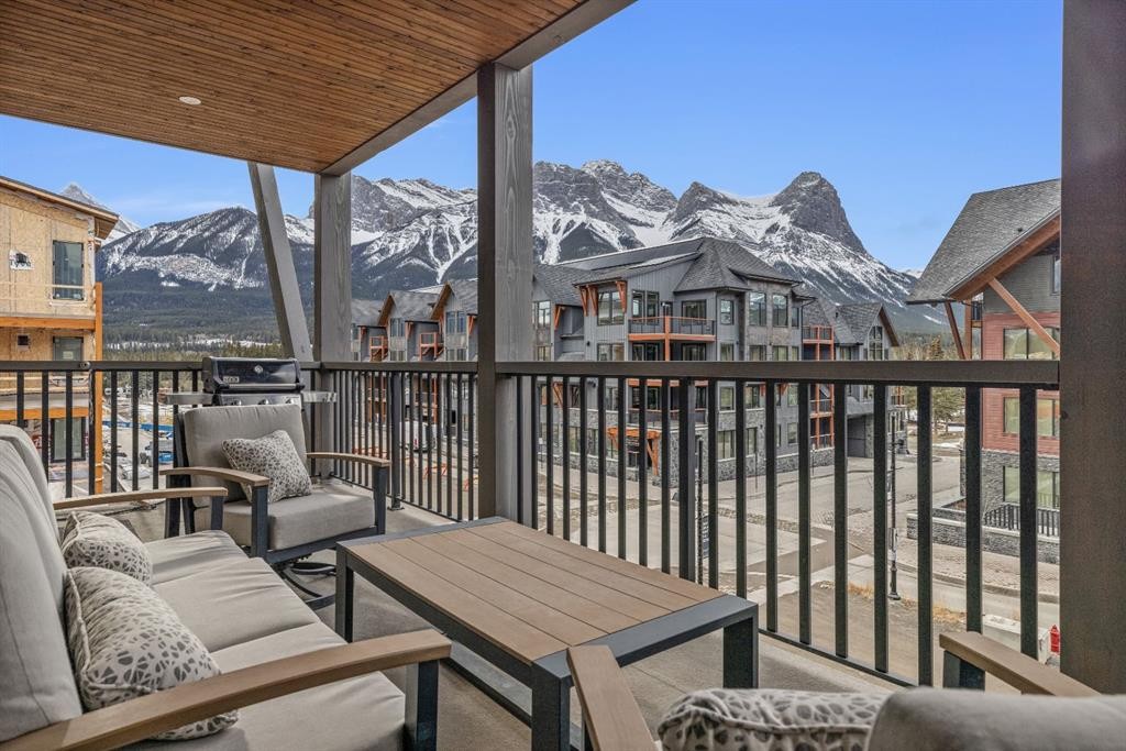 313-1408 Spring Creek Gate, Canmore, AB - Outdoor With Deck Patio Veranda With Exterior