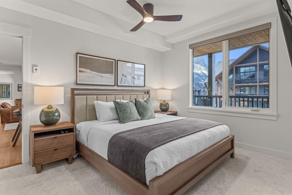313-1408 Spring Creek Gate, Canmore, AB - Indoor Photo Showing Bedroom