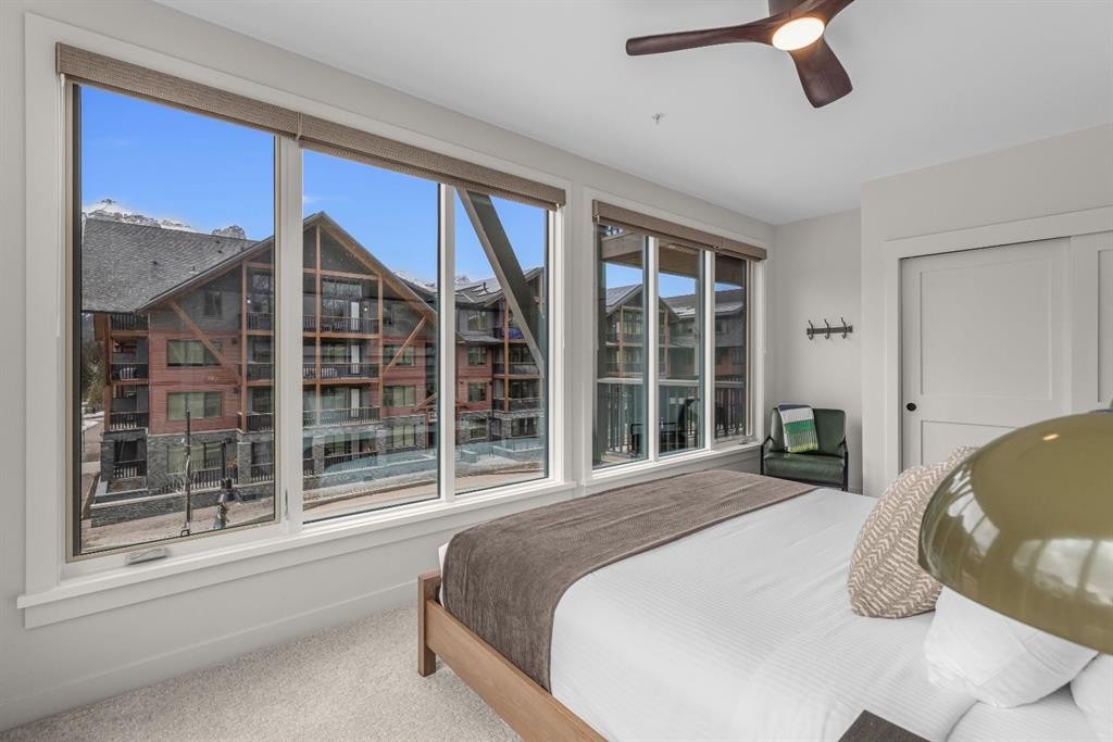 313-1408 Spring Creek Gate, Canmore, AB - Indoor Photo Showing Bedroom