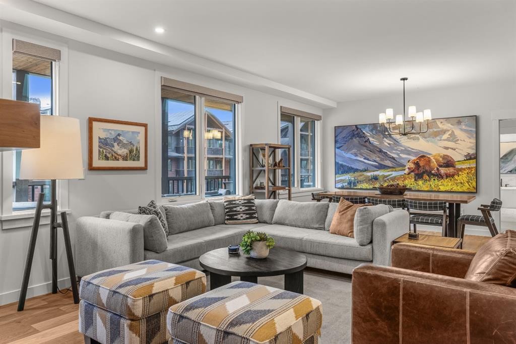 313-1408 Spring Creek Gate, Canmore, AB - Indoor Photo Showing Living Room