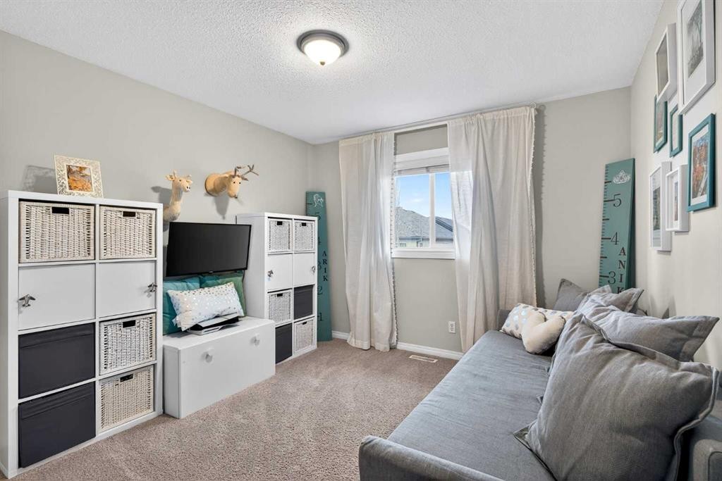 69 Elkton Way Sw, Calgary, AB - Indoor Photo Showing Bedroom