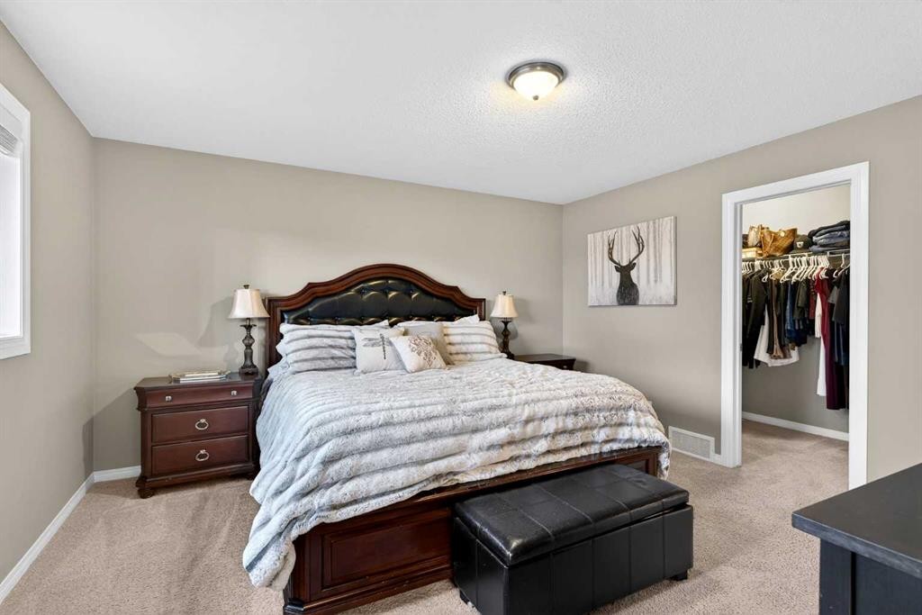 69 Elkton Way Sw, Calgary, AB - Indoor Photo Showing Bedroom