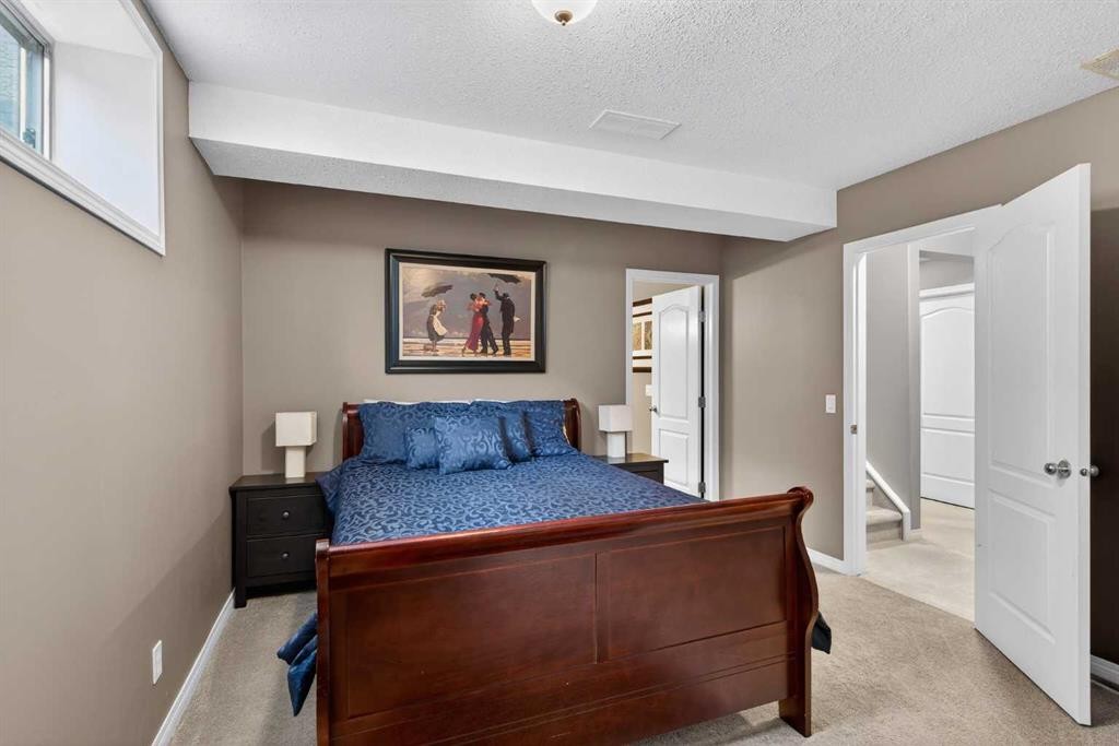 69 Elkton Way Sw, Calgary, AB - Indoor Photo Showing Bedroom