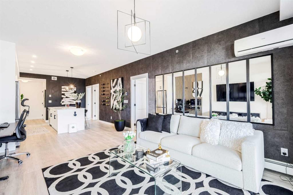 2401-200 Seton Circle Se, Calgary, AB - Indoor Photo Showing Living Room
