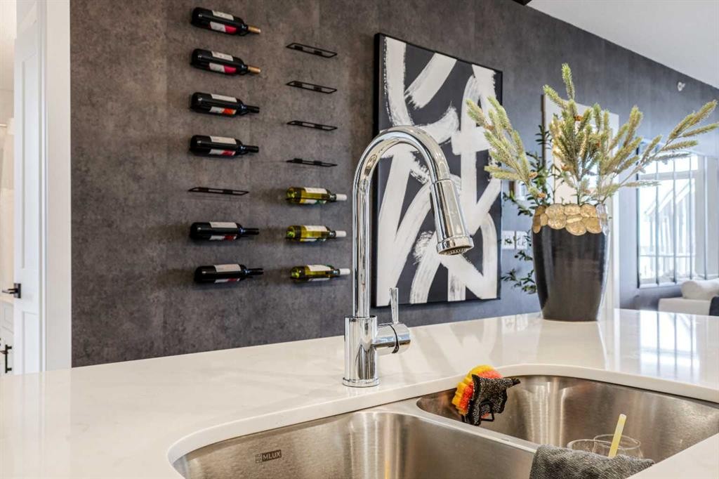 2401-200 Seton Circle Se, Calgary, AB - Indoor Photo Showing Kitchen With Double Sink