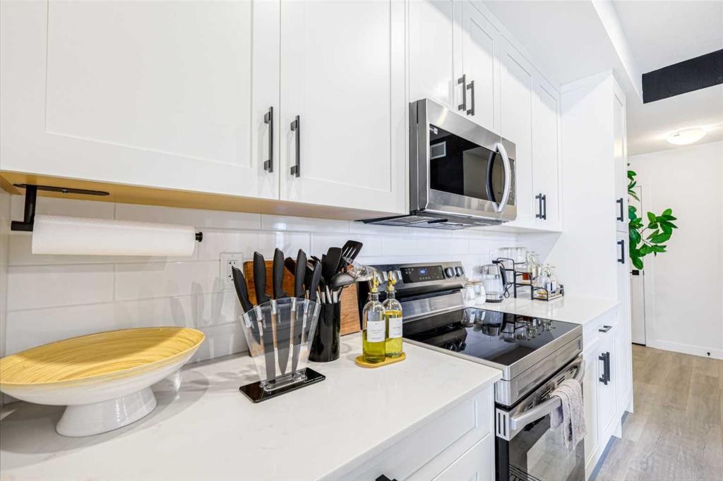 2401-200 Seton Circle Se, Calgary, AB - Indoor Photo Showing Kitchen