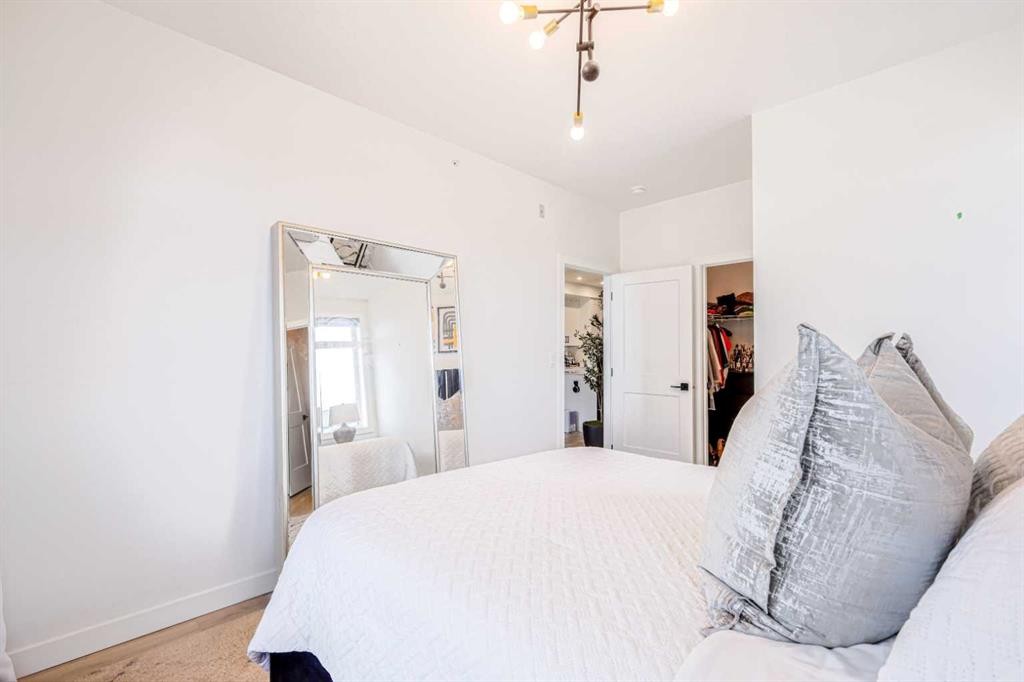 2401-200 Seton Circle Se, Calgary, AB - Indoor Photo Showing Bedroom