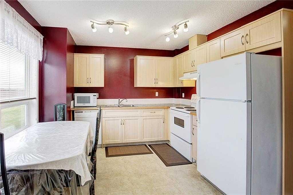 2102-111 Tarawood Lane Ne, Calgary, AB - Indoor Photo Showing Kitchen With Double Sink