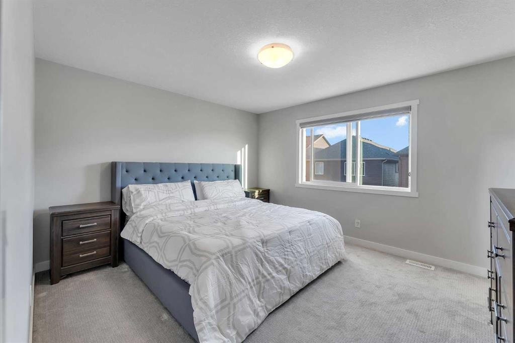 39 Savanna Way Ne, Calgary, AB - Indoor Photo Showing Bedroom