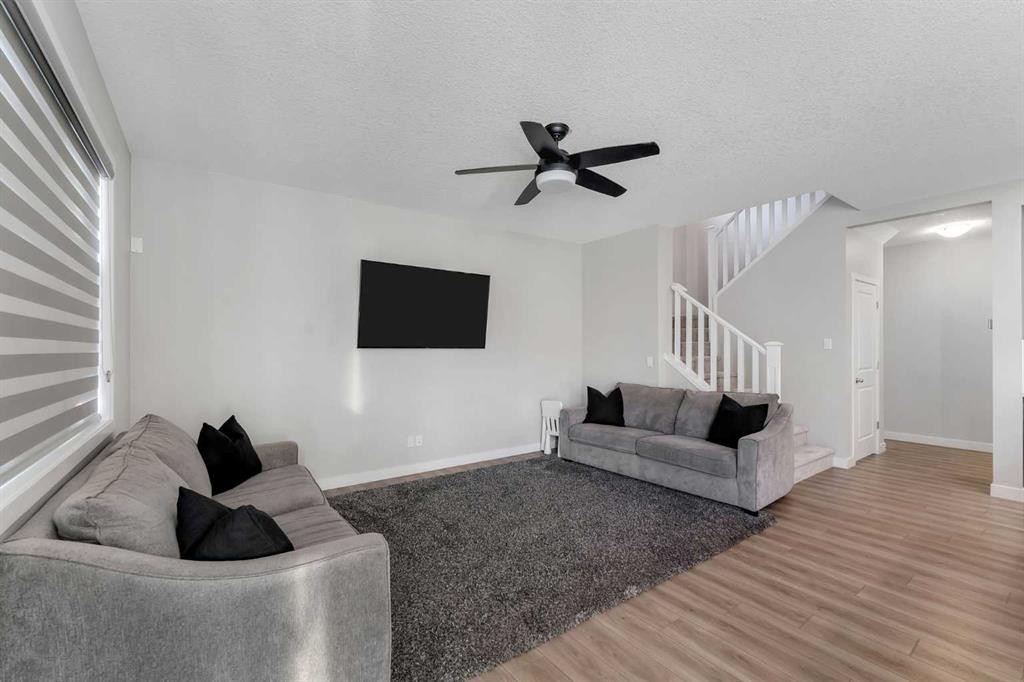 39 Savanna Way Ne, Calgary, AB - Indoor Photo Showing Living Room