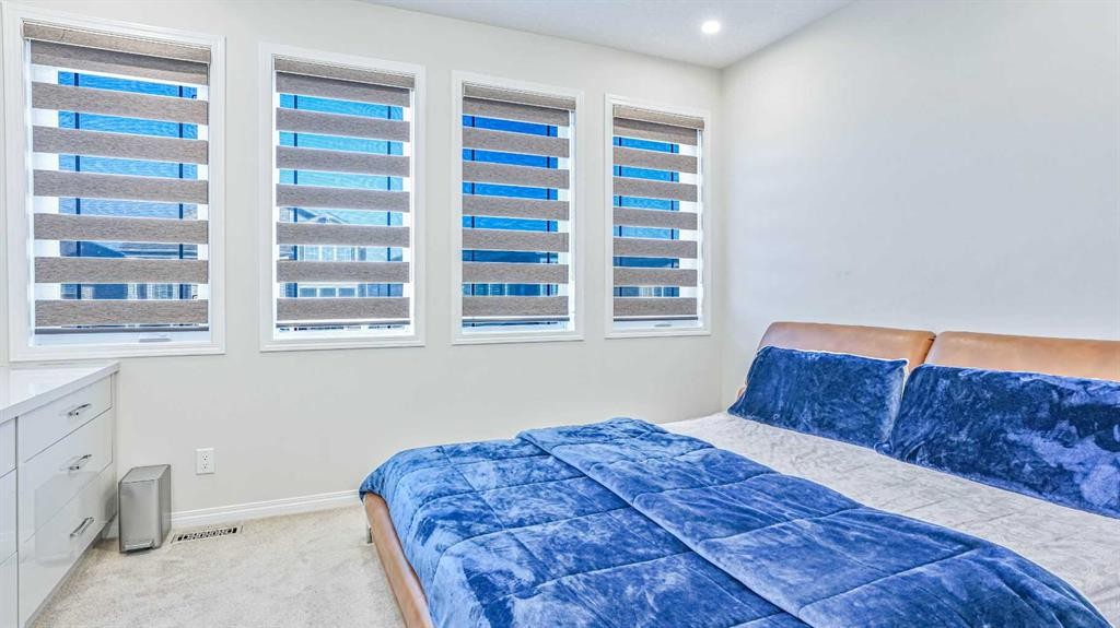 69 Carrington Way Nw, Calgary, AB - Indoor Photo Showing Bedroom