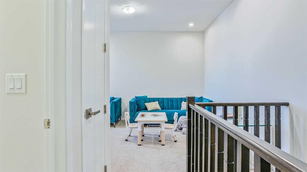 69 Carrington Way Nw, Calgary, AB - Indoor Photo Showing Other Room