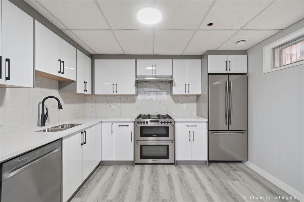 2309 50 Street Ne, Calgary, AB - Indoor Photo Showing Kitchen With Double Sink With Upgraded Kitchen