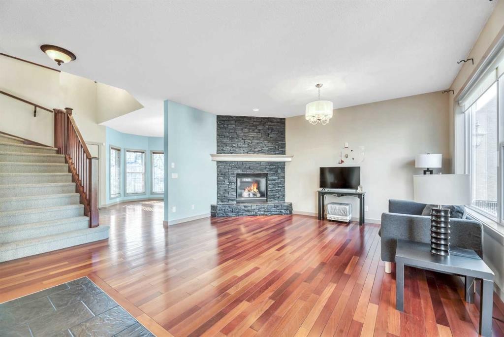 63 Discovery Ridge Circle Sw, Calgary, AB - Indoor Photo Showing Living Room With Fireplace
