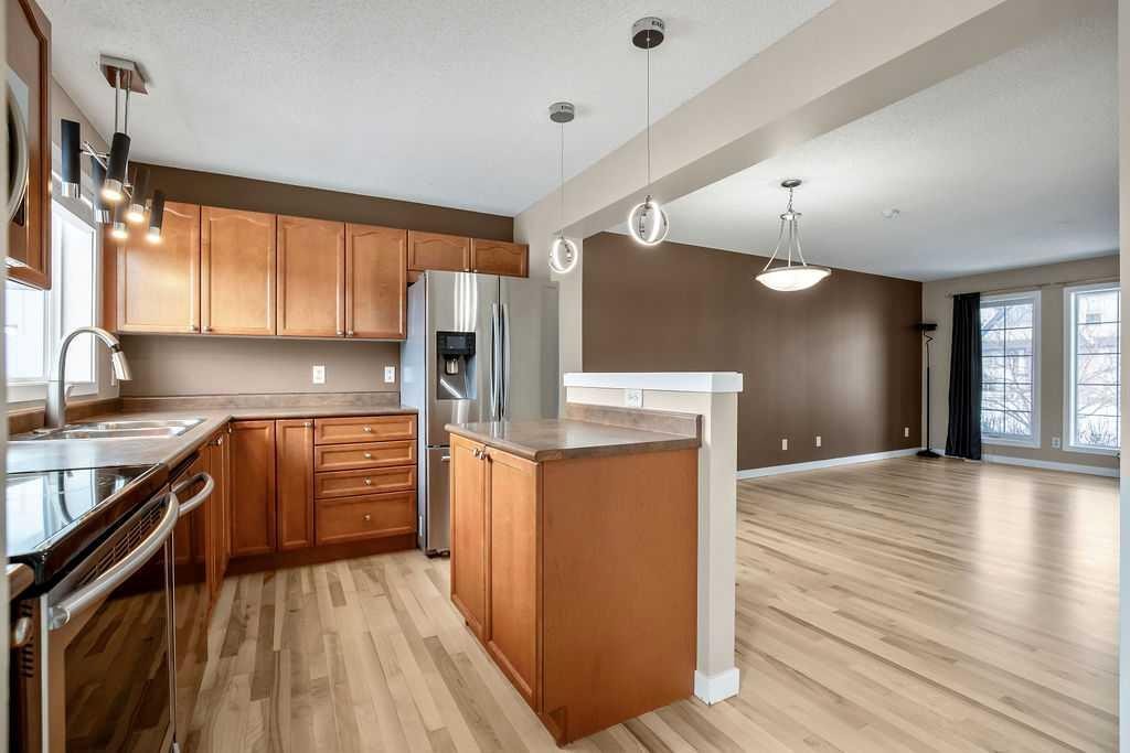 230 Elgin Place Se, Calgary, AB - Indoor Photo Showing Kitchen With Stainless Steel Kitchen With Double Sink