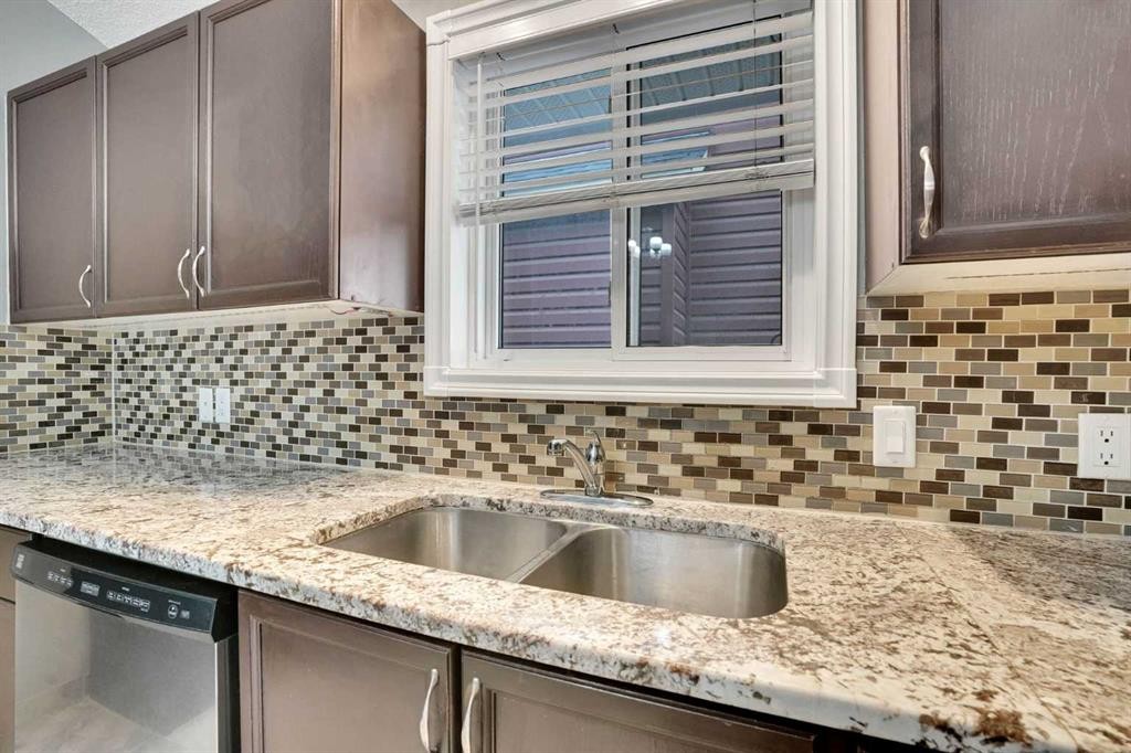 131 Martinridge Grove Ne, Calgary, AB - Indoor Photo Showing Kitchen With Double Sink With Upgraded Kitchen
