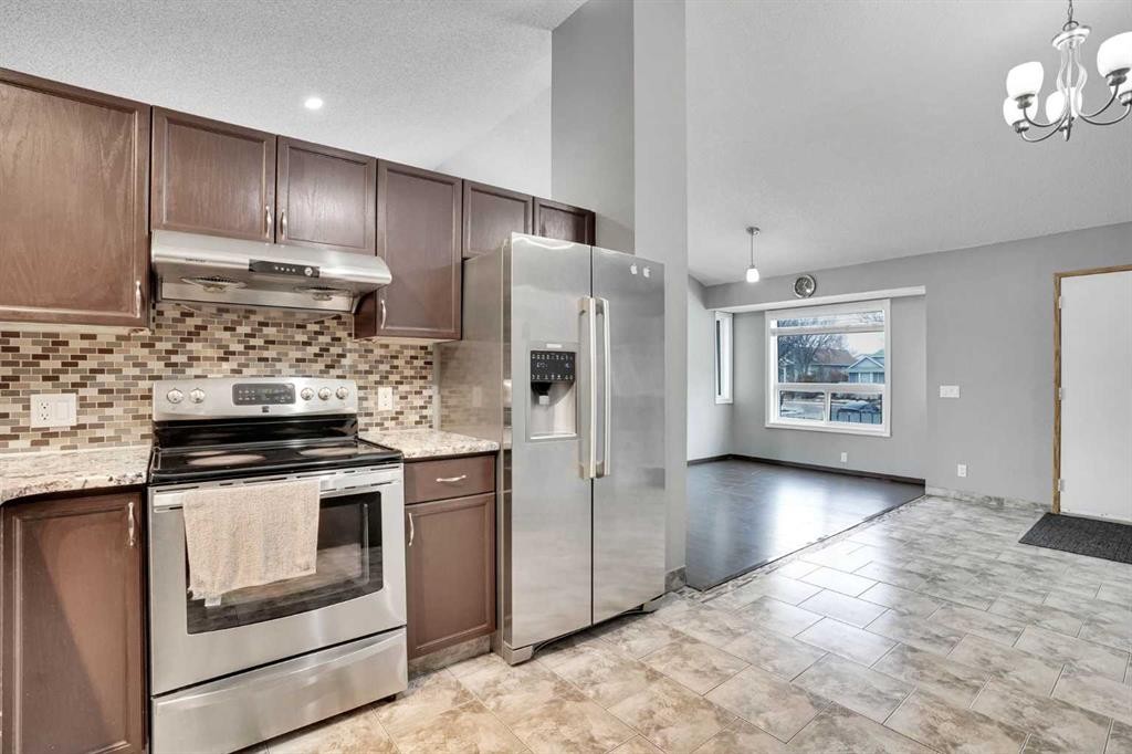 131 Martinridge Grove Ne, Calgary, AB - Indoor Photo Showing Kitchen With Upgraded Kitchen