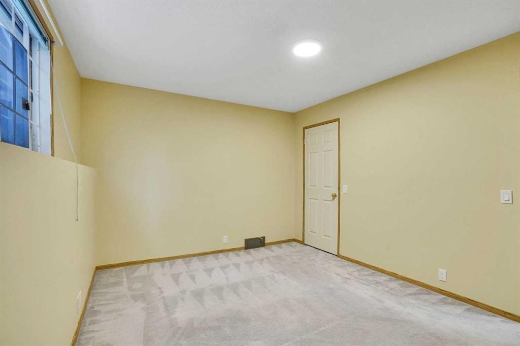 131 Martinridge Grove Ne, Calgary, AB - Indoor Photo Showing Other Room