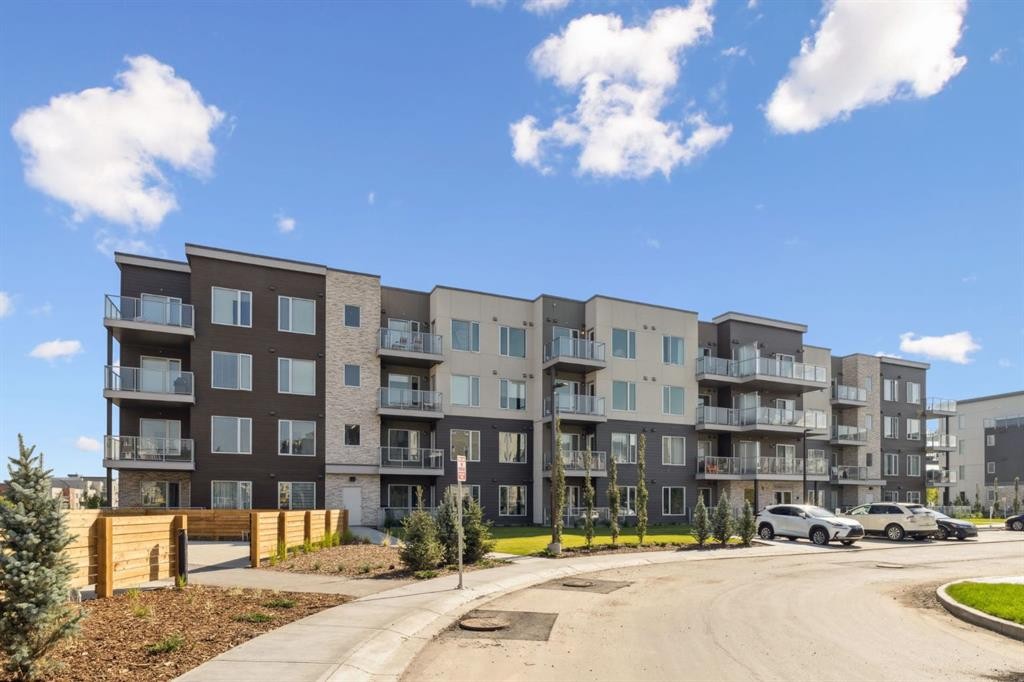 412-700 Shawnee Square Sw, Calgary, AB - Outdoor With Balcony With Facade