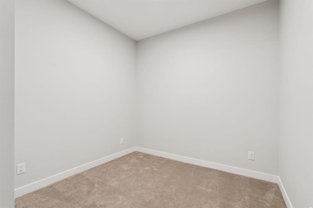 412-700 Shawnee Square Sw, Calgary, AB - Indoor Photo Showing Other Room
