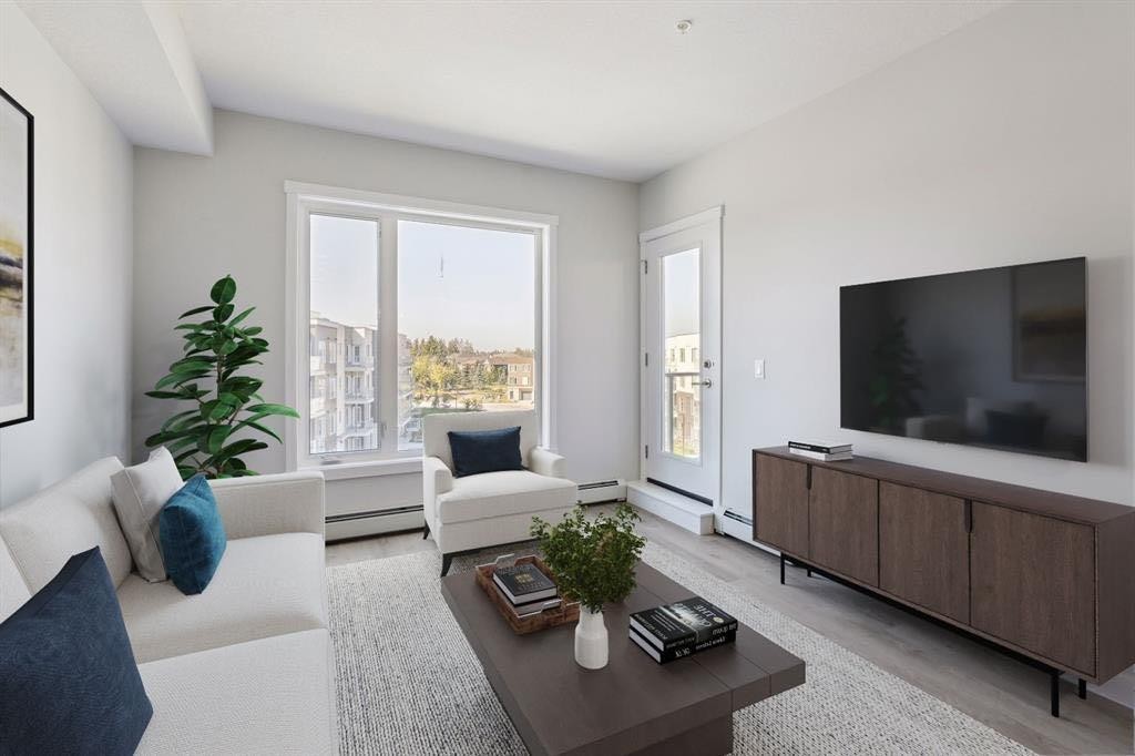 412-700 Shawnee Square Sw, Calgary, AB - Indoor Photo Showing Living Room