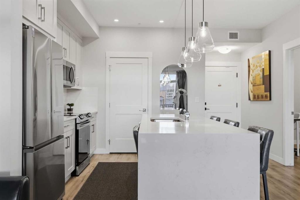 4210-200 Seton Circle Se, Calgary, AB - Indoor Photo Showing Kitchen With Upgraded Kitchen