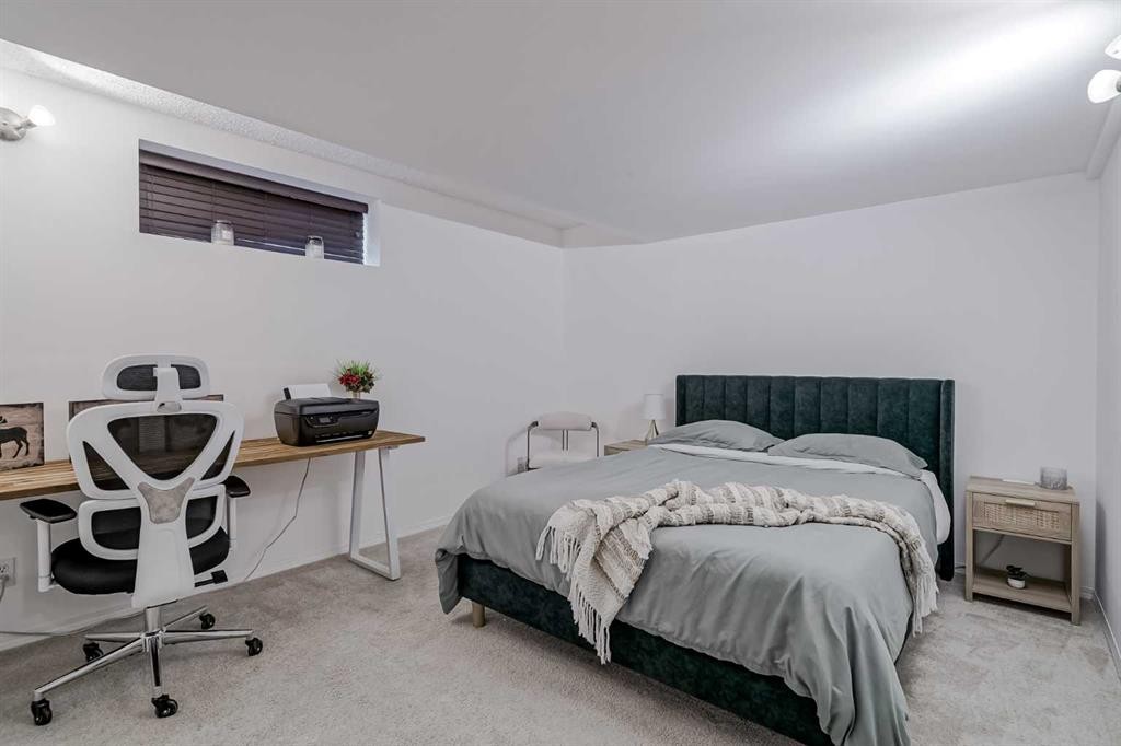 67 Silver Springs Way Nw, Airdrie, AB - Indoor Photo Showing Bedroom