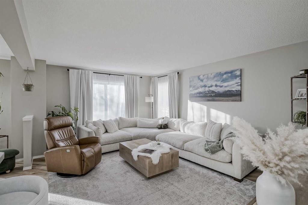 67 Silver Springs Way Nw, Airdrie, AB - Indoor Photo Showing Living Room