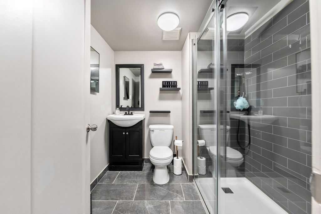 9136 Allison Drive Se, Calgary, AB - Indoor Photo Showing Bathroom