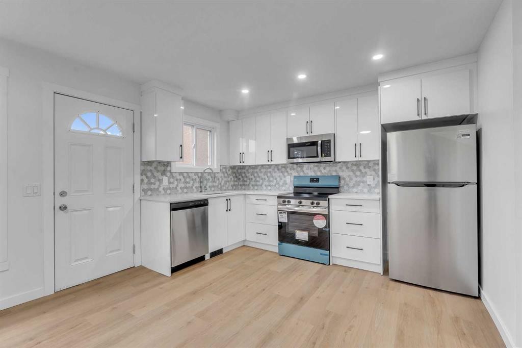 63 Penworth Close Se, Calgary, AB - Indoor Photo Showing Kitchen With Stainless Steel Kitchen With Upgraded Kitchen