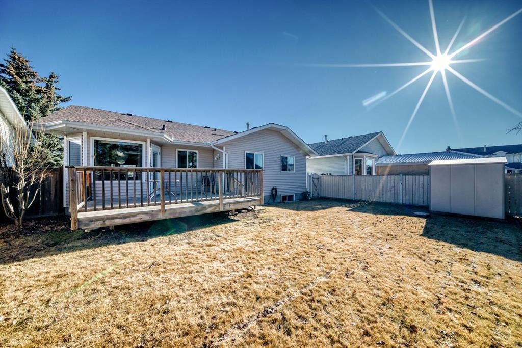 32 West Mackay Crescent, Cochrane, AB - Outdoor With Deck Patio Veranda