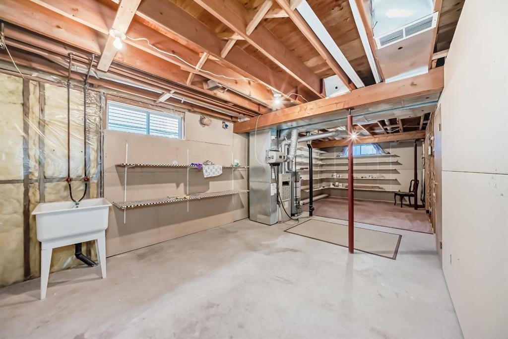32 West Mackay Crescent, Cochrane, AB - Indoor Photo Showing Basement