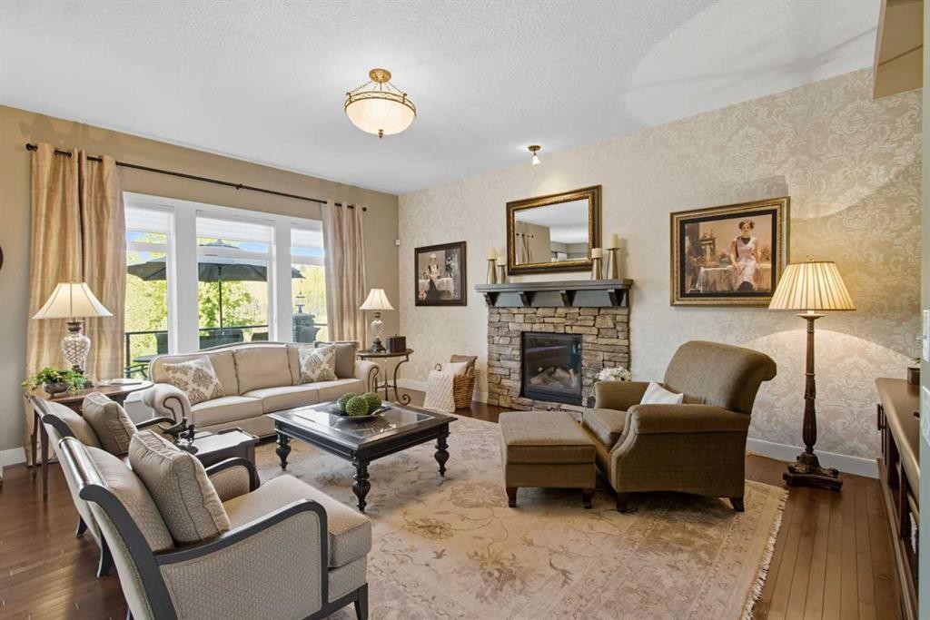 41 Evergreen Mount Sw, Calgary, AB - Indoor Photo Showing Living Room With Fireplace