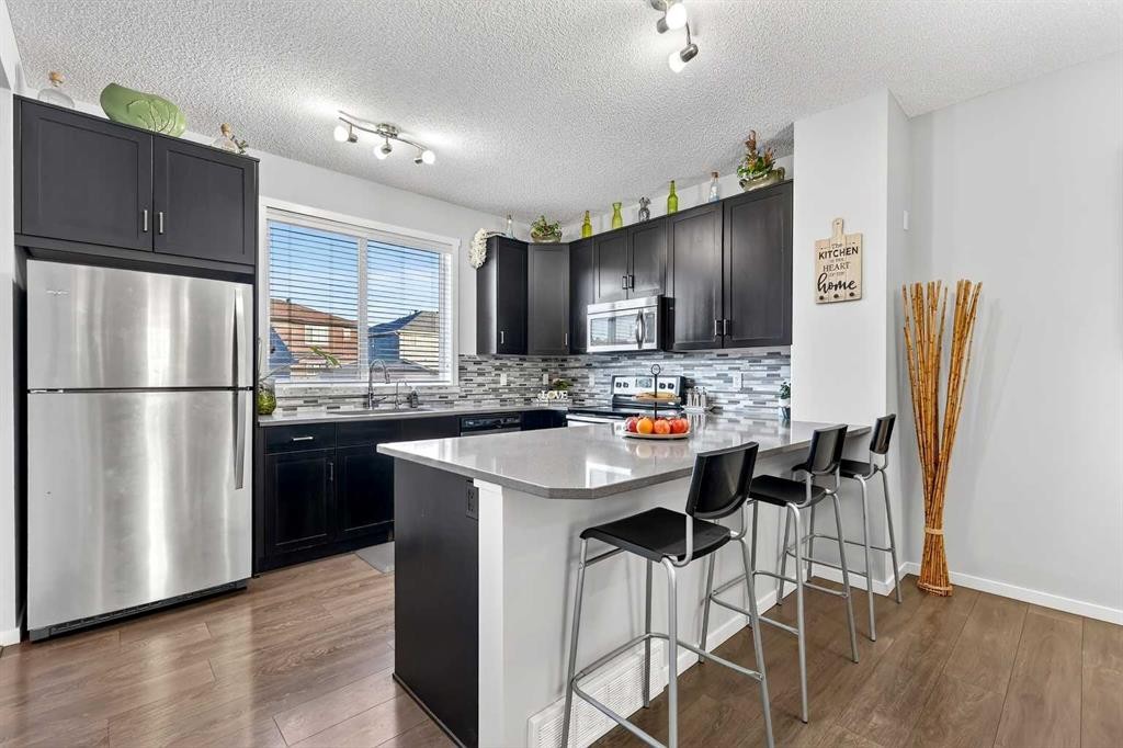 140 Savanna Road Ne, Calgary, AB - Indoor Photo Showing Kitchen With Upgraded Kitchen