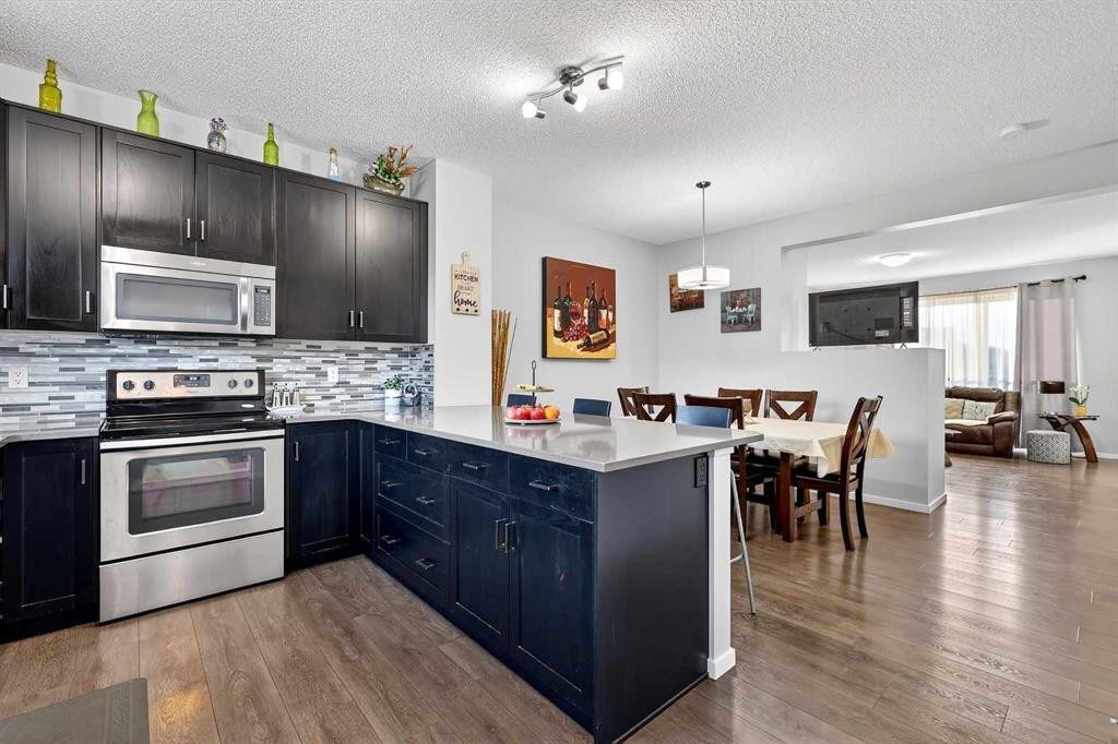 140 Savanna Road Ne, Calgary, AB - Indoor Photo Showing Kitchen With Upgraded Kitchen
