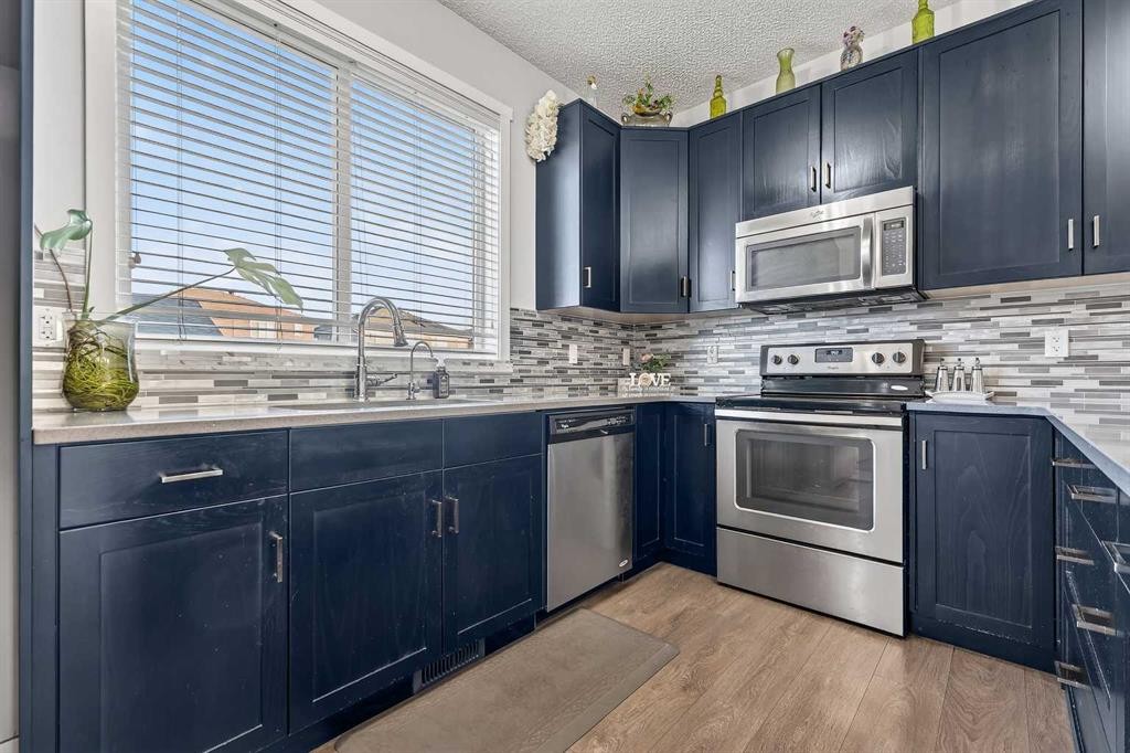140 Savanna Road Ne, Calgary, AB - Indoor Photo Showing Kitchen With Upgraded Kitchen
