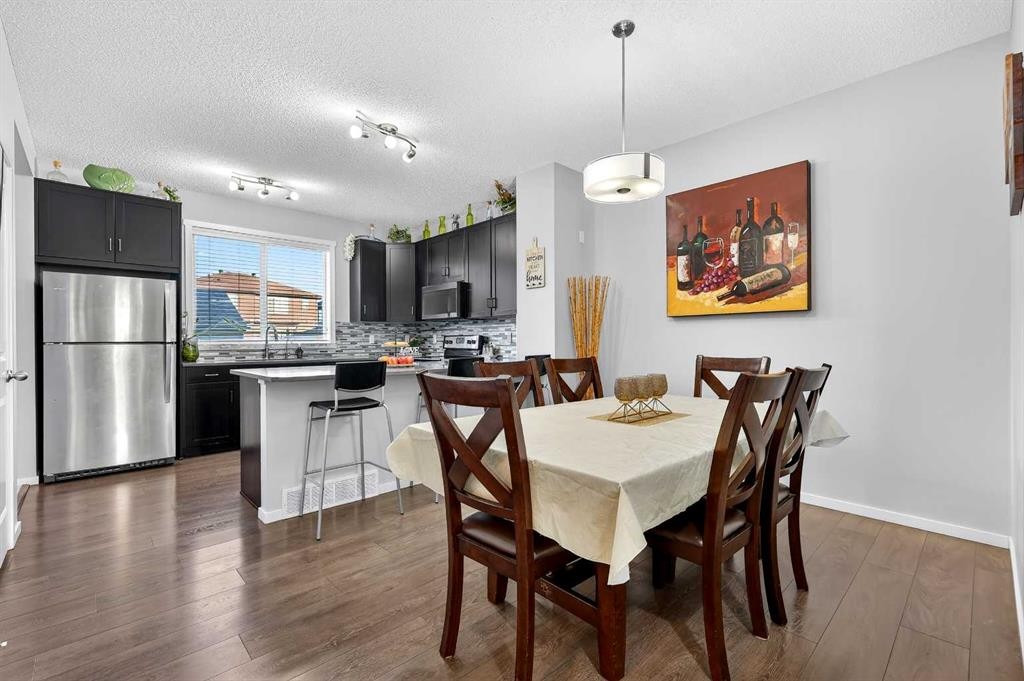 140 Savanna Road Ne, Calgary, AB - Indoor Photo Showing Dining Room