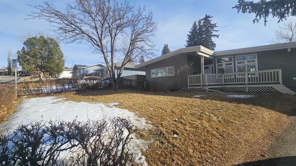 4 Clarendon Road Nw, Calgary, AB - Outdoor With Deck Patio Veranda