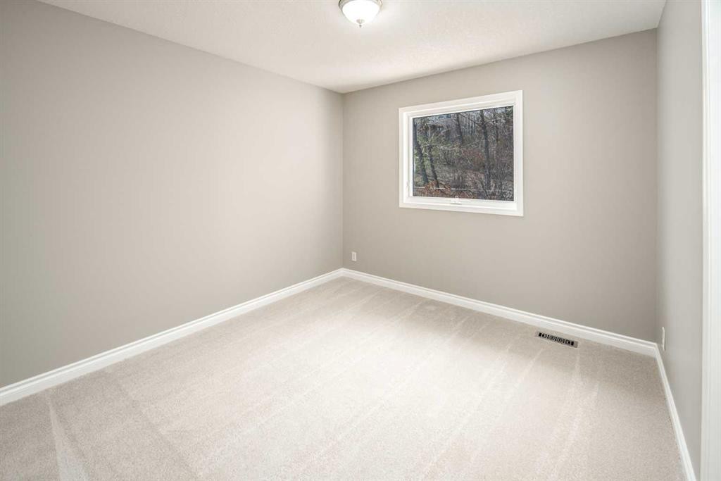 79 Hamptons Heights Nw, Calgary, AB - Indoor Photo Showing Other Room