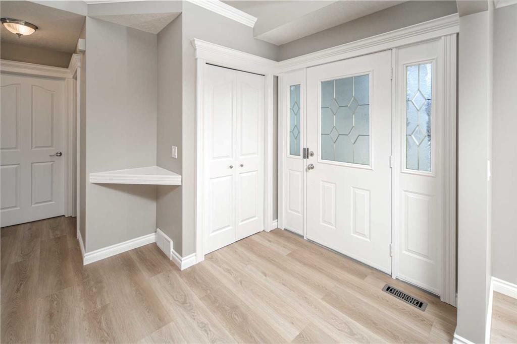 79 Hamptons Heights Nw, Calgary, AB - Indoor Photo Showing Other Room